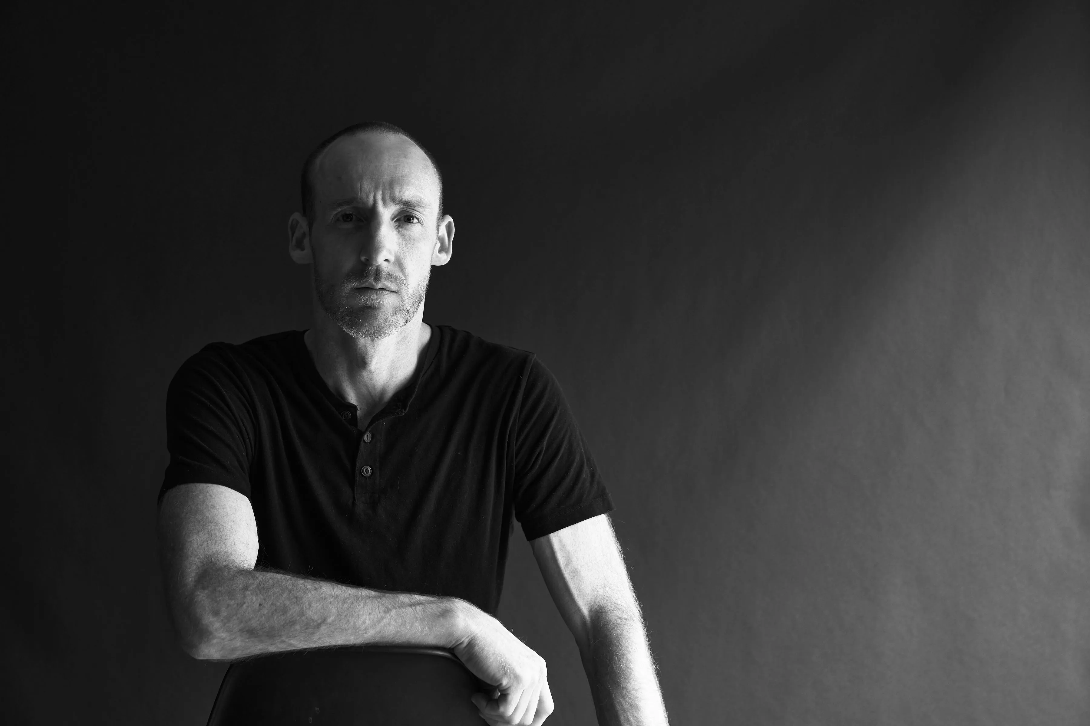 A professional headshot of Ben Evans for an Executive Profile.