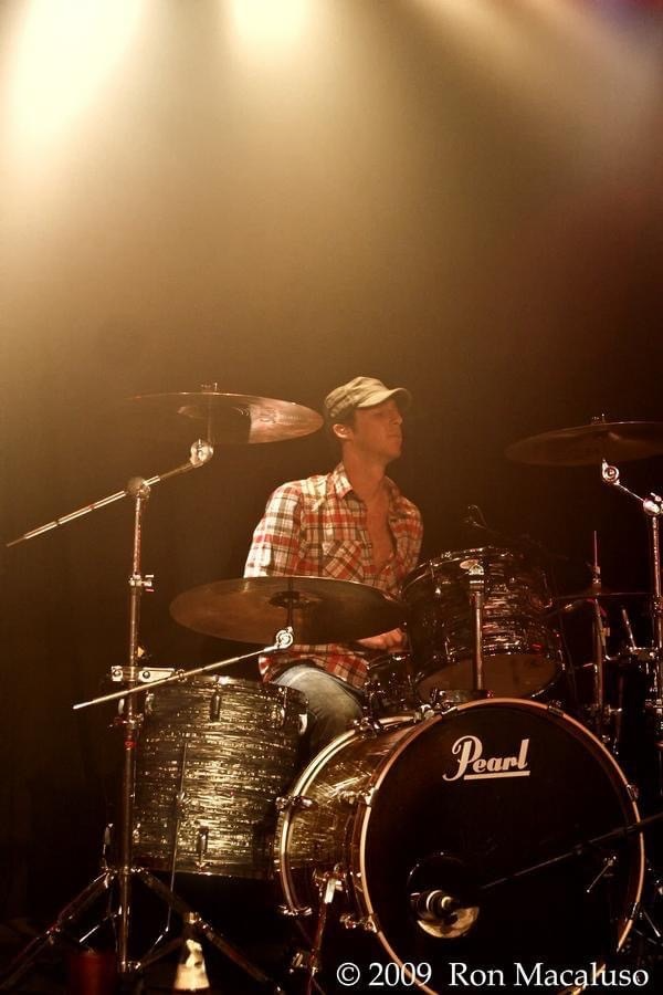 On stage with drums